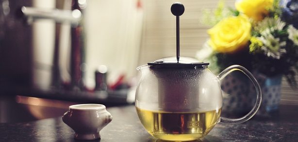 tea pot with yellow flowers